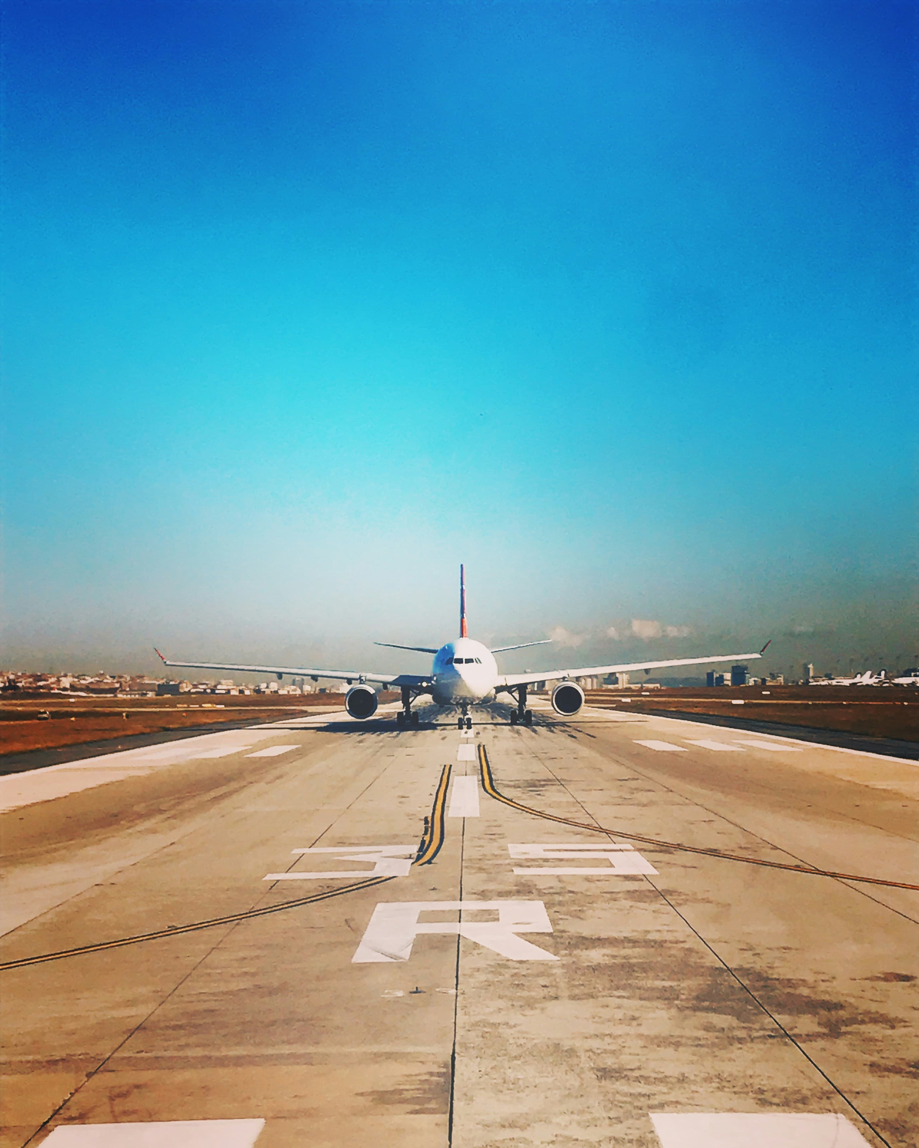 Commercial aircraft on final approach to the runway
